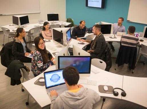 Photo of students in computer classroom.