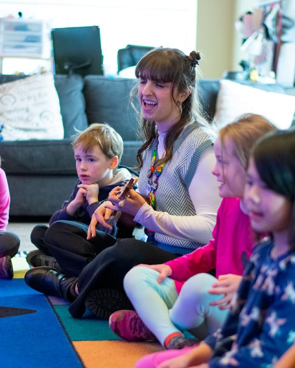 Music teacher Shannon O'Leary leads her kindergarten students in a music exercise.