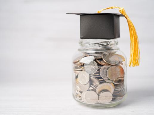 money jar with graduation cap