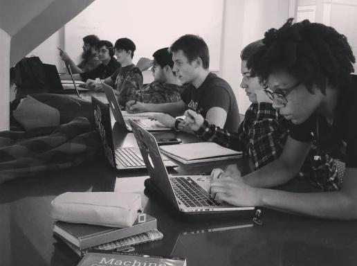 Students studying at laptops
