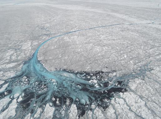A supraglacial river seen from a helicopter in Greenland