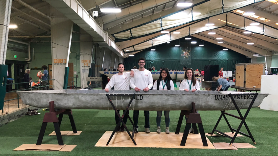 Concrete Canoe team in front of their canoe