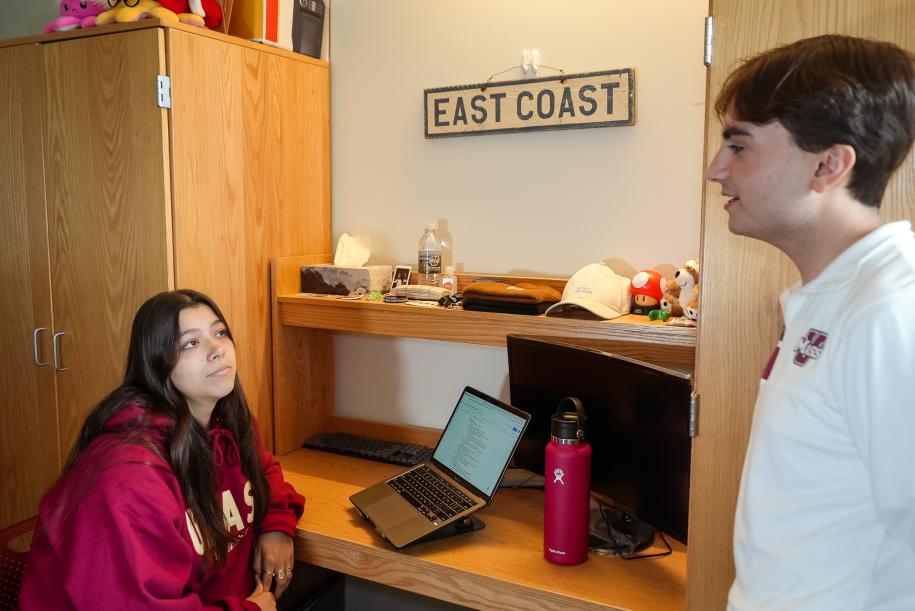 Two students work in a residence hall at the University of Massachusetts