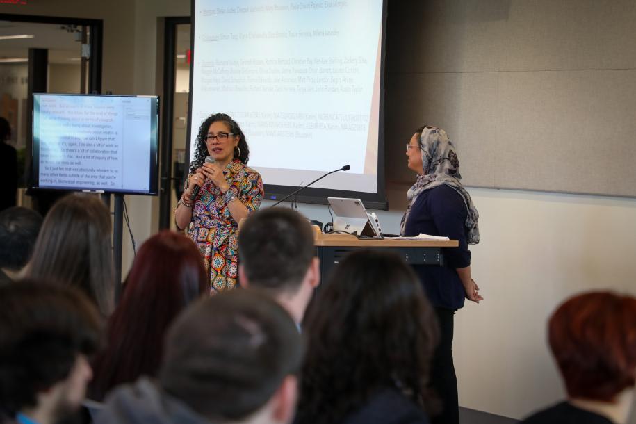 Mari Castañeda introduces Lamya Karim at MassURC at the University of Massachusetts