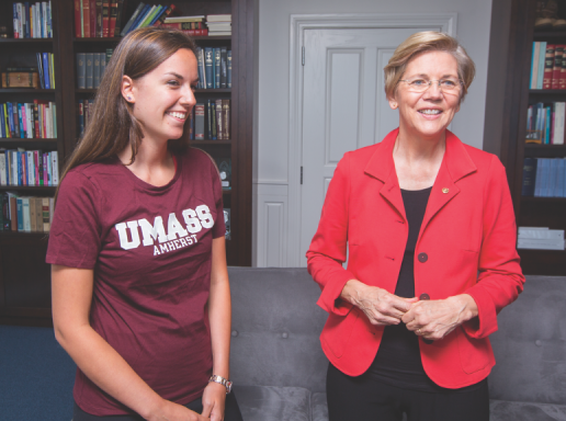 Image of UMass students talking to Senator Elizabeth Warren. 